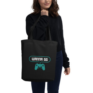 A black tote bag on which is written "wanna gg" in white with a green PlayStation controller