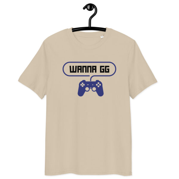 A beige tshirt on which is writting "wanna gg" in black with a blue PlayStation controller