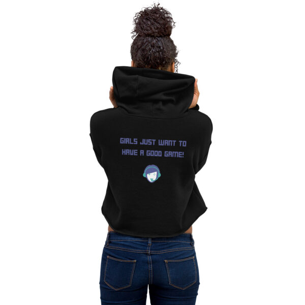 A woman posing from behind wearing a black sweatshirt on which is written "girls just want to have a good game!" in blue with our website logo