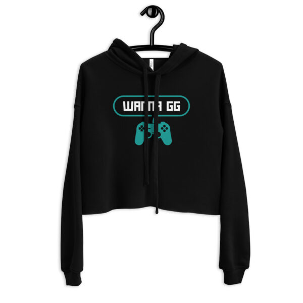 A black sweatshirt on which is writting "wanna gg" in white with a green PlayStation controller