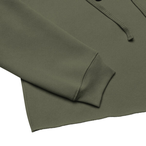 Details and zoom on the khaki-coloured sweatshirt sleeve