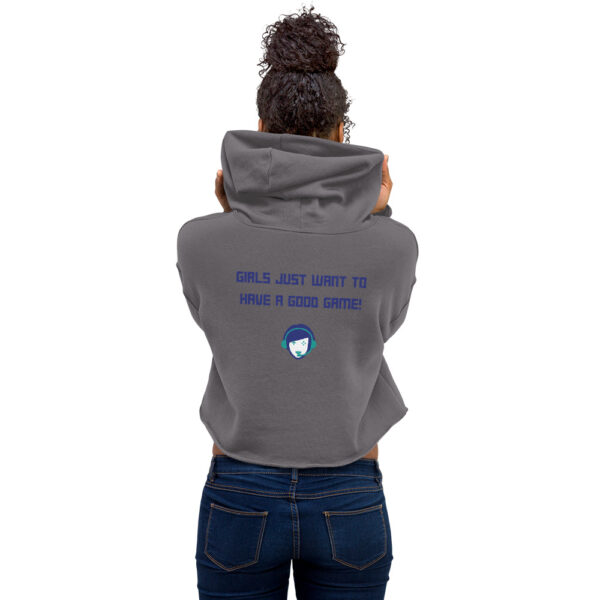 A woman posing from behind wearing a grey sweatshirt on which is written "girls just want to have a good game!" in blue with our website logo